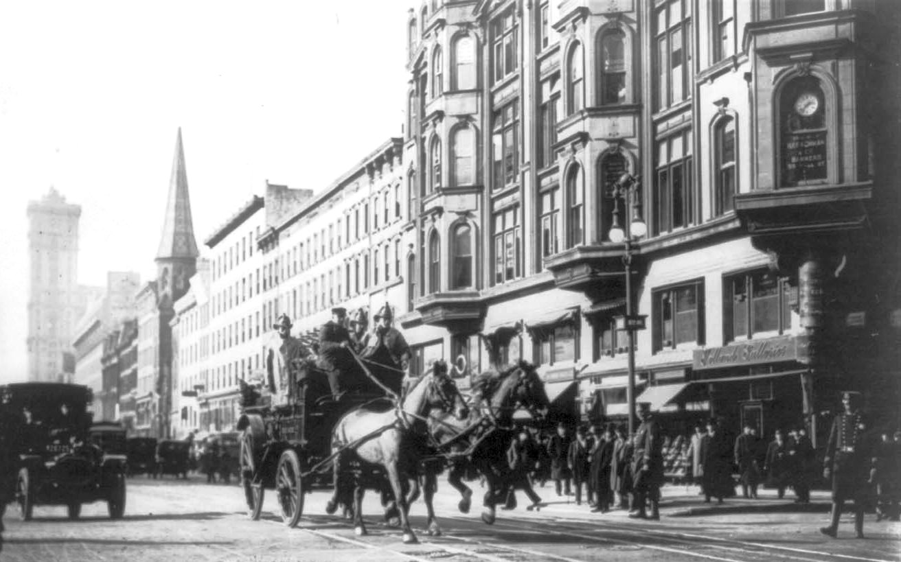 Fire truck pulled by horses